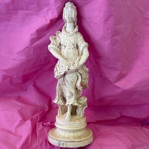 Elegant Cream Figurine